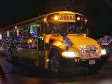 Yellow School Bus belonging to Aksamit Transportation decorated in Christmas Lights for the local holiday parade